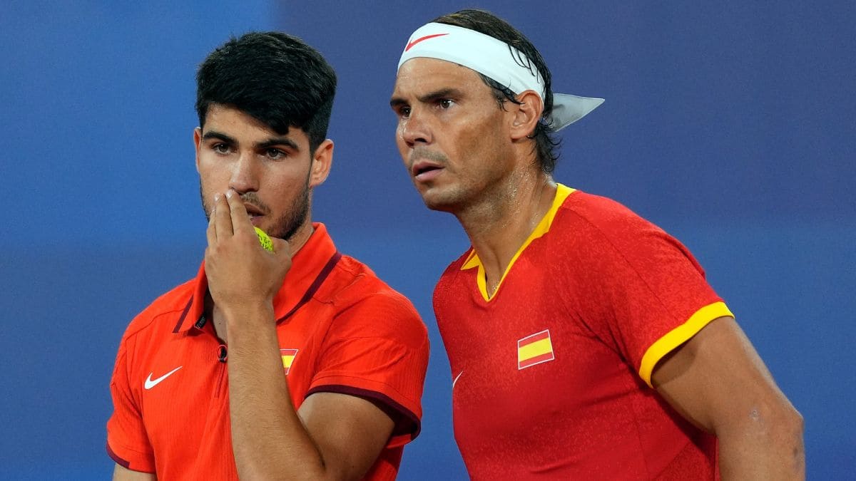 Nadal y Alcaraz durante un partido de los Juegos Olímpicos de París 2024 jubilación tenistas profesionales