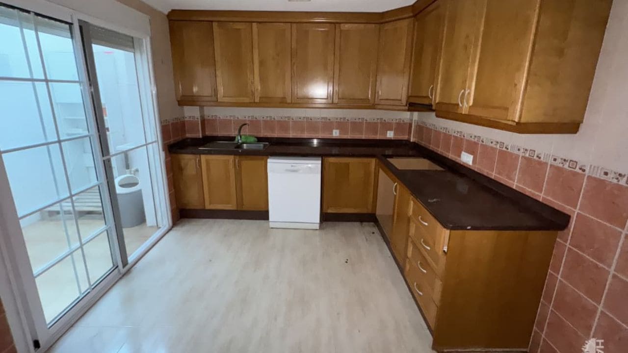 Cocina del piso que ofrece Caixabank en Haya Inmobiliaria